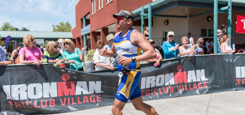 A California Triathlon athlete racing at a U.S. IRONMAN 70.3 event